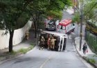 Caminhão tomba em rua do bairro Buritis, região Oeste de BH, e motorista fica ferido