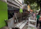 Estrutura de entrada de loja desaba e fere dois homens durante troca de telhado em Governador Valadares